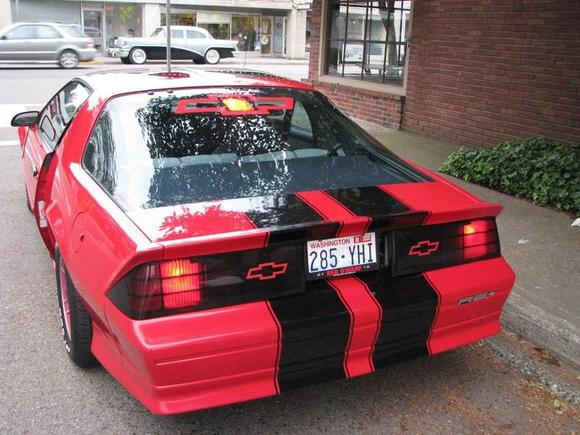 Cam's butt on her first outing after her makeover. I love that we centered the bow tie on the light and that it glows through the center.