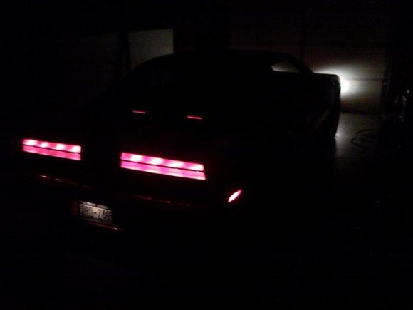 A night picture with only running lights and fog lights...i though it looked really cool...you can see the two amps in the back too