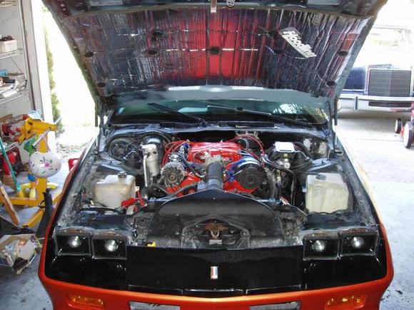 Engine painted with Duplicolor &quot;Chevy Orange Red&quot; high temperature paint (ceramic enamel paint).  With these engines, you must have a heat barrier attached to the bottom side of hood; my choice, the 3/4&quot; Hoodliner.