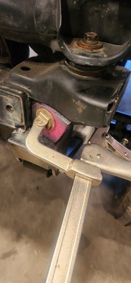 So instead i put it in the vise. Red hot with the torch and then set it in place. With the wide vise grips i then somewhat contoured into the body mount. This took about three times of heating it and crimping it. But i think it came out a little bit better.