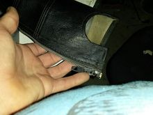 after vinyl repair liquid not too bad really no sign of the tear which would have run along the line of my mid finger from the inside heading towards the zipper