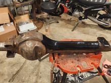 Top of axle and inside of truss painted before truss gets welded on.