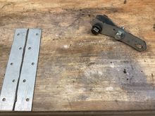 Simpson nailer on left after being cut in half. Finished cable extension on the right.