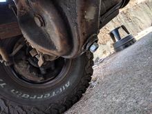 Drain plug was seized, so I welded a nut onto the plug. Came right out.