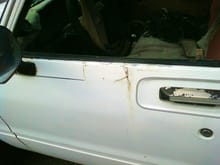 major door rot the pach is held on with rivets an bondo it needs replaced