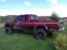 In the summers we both like to go naked plus she got a ProComp 3' lift, new 15x8' rims, 3' MagnaFlow exhaust from the cat back, rhino lined the bottom, tinted windows and a new tail gate