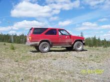 my truck with old tires and i took those ugly rusted things offf lol