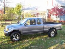 98 tacoma sr5 auto 4cyl,,, did 16 grand damage to her in 2001!!  sold her in nov 08, layed off needed money,, another great yota i've owned