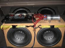 Really Old System. Before the 15's. Running 4 12's. 
2 pioneer, 2 punch p1's. 1600watt Sound Storm 4 channel amp. 500k mircofarad Cap.
