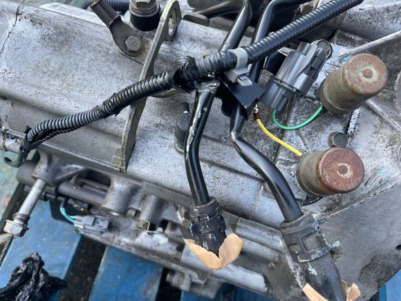 Lines bent and cracked beyond saving. One wire out of a connector. Why?