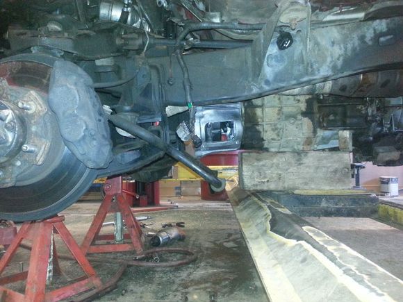 I had the rear raised higher than the front so woth the drivetrain tilt I could lower the old and lift the new transmission flat and not have to tilt it to line it up and the drivetrain was sitting level with the ass in the air.