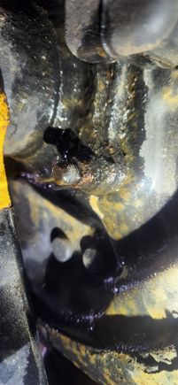 After spending maybe an hour being perplexed on not being able to get either of the two 1/4" parking cable pins loose i moved too unbolting the axle shafts. These were unnecessarily tight. Had to my leg on some of them to break loose. I started with the top two on driver side. Went to the bottom two and the wrench didn't even try to grab the nut. Someone in the past 💯 completely rounded both of them off. Idk if it was from trying to loosen or over tightened.