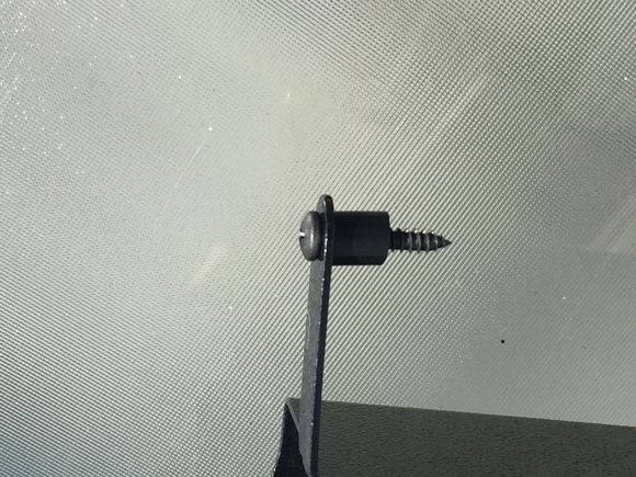 I used a small piece of vacuum hose as a spacer on each.mount ing screw.