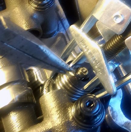 VERY CAREFULLY removing the keepers.....you DONT want to drop one of those down into the motor