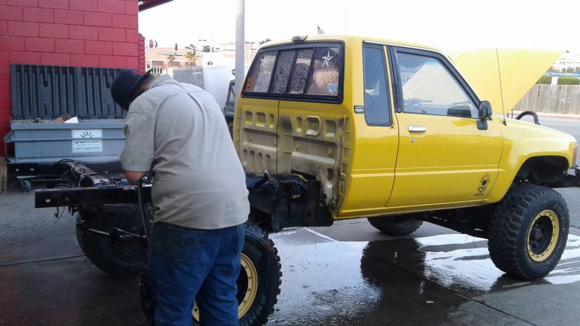 cleaning the frame up after removing the old bed. there is only 6 bolts that hold the bed down, fuel filler neck (3 screws) and the tail lights - very easy to remove