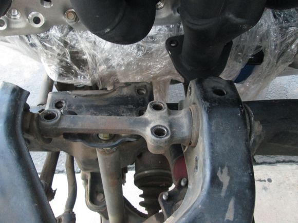The major problem is this header exit is completely in the way of the upper control arm and Torson bar mounting point not even close to clearing.
