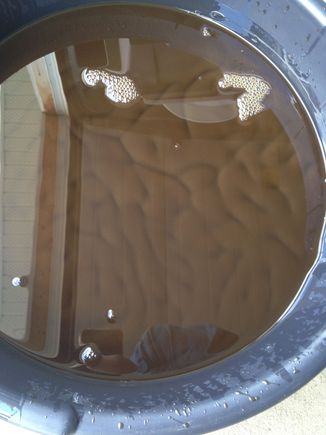 Looks bad.  there was also a couple chunks of the old shift ball seat in there as well(expected).  It does look like a lot of chrome in the oil though..  probably the input bearing by what most are saying.