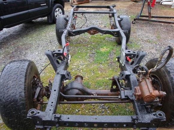 The frame all done and ready to put back together. The spray on bed liner looks SWEET.