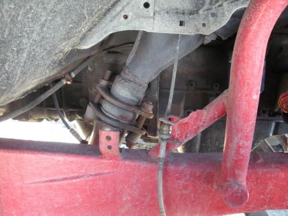 this is the flange i decided to use. it is from a pacesetter header for the 22re.  the exhaust crosses over to the driverside here.