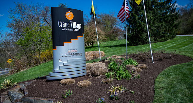 Crane Village Apartments Entry Signage
